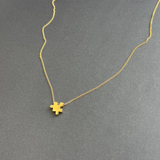 Gold Puzzle Piece Pendant Necklace